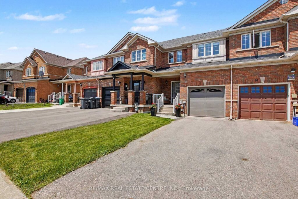 94 Timbertop Crescent, Brampton - front elevation of the brick townhome