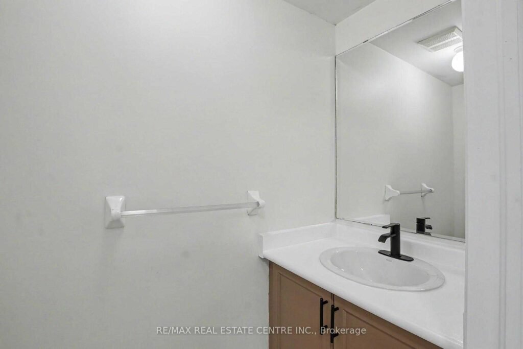 94 Timbertop Crescent, Brampton - main-floor powder room with modern vanity