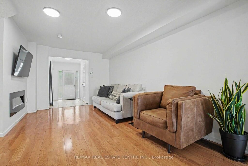 94 Timbertop Crescent, Brampton - open living area with hardwood floors