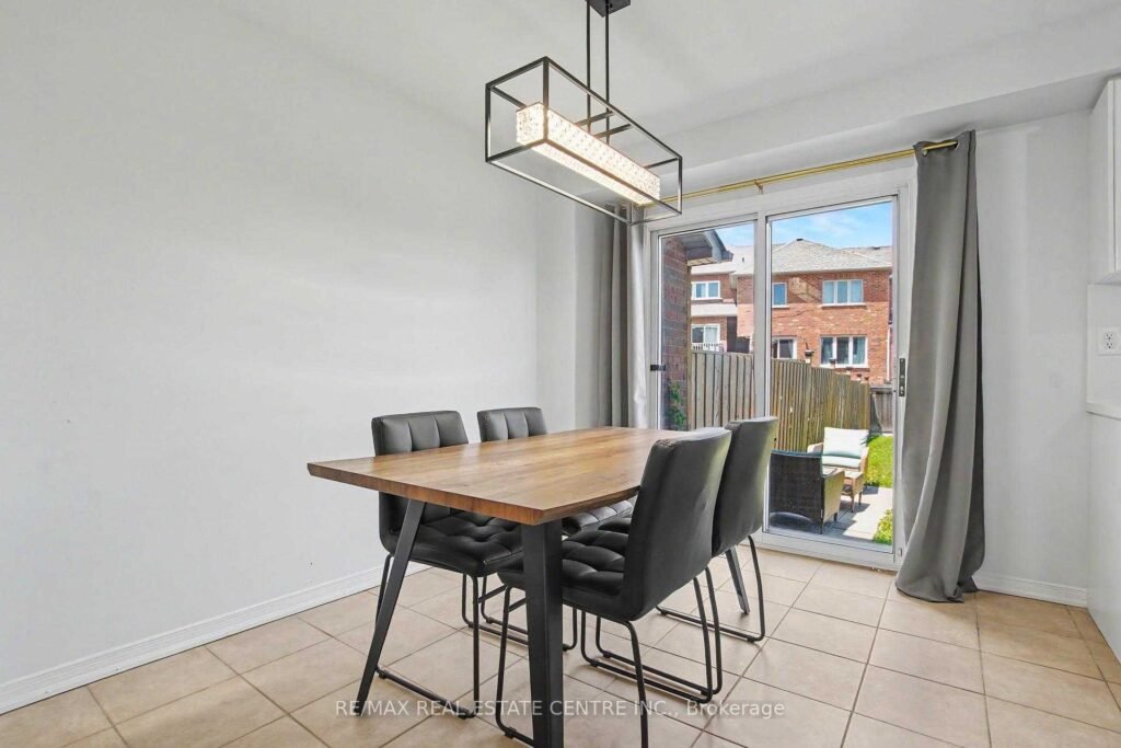 94 Timbertop Crescent, Brampton - dining room with pendant light