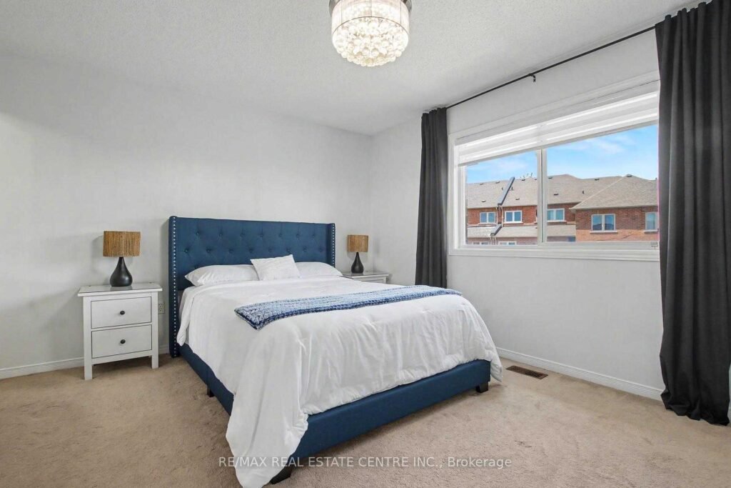 94 Timbertop Crescent, Brampton - primary bedroom with large window