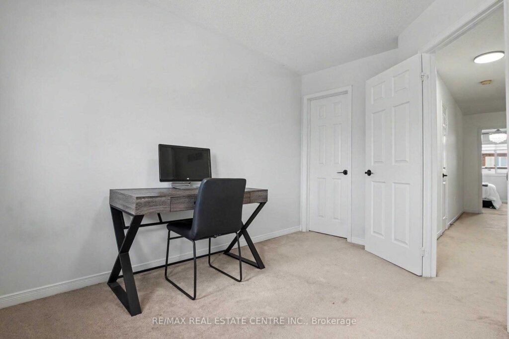 94 Timbertop Crescent, Brampton - bedroom with double closet and work desk