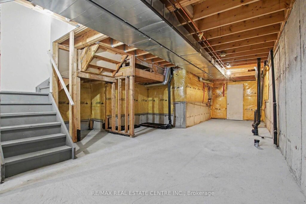 94 Timbertop Crescent, Brampton - unfinished basement with staircase