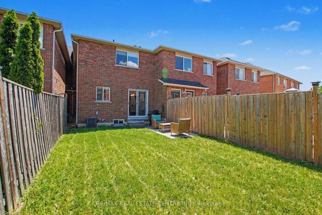 94 Timbertop Crescent, Brampton - deep fenced backyard looking to the rear fence